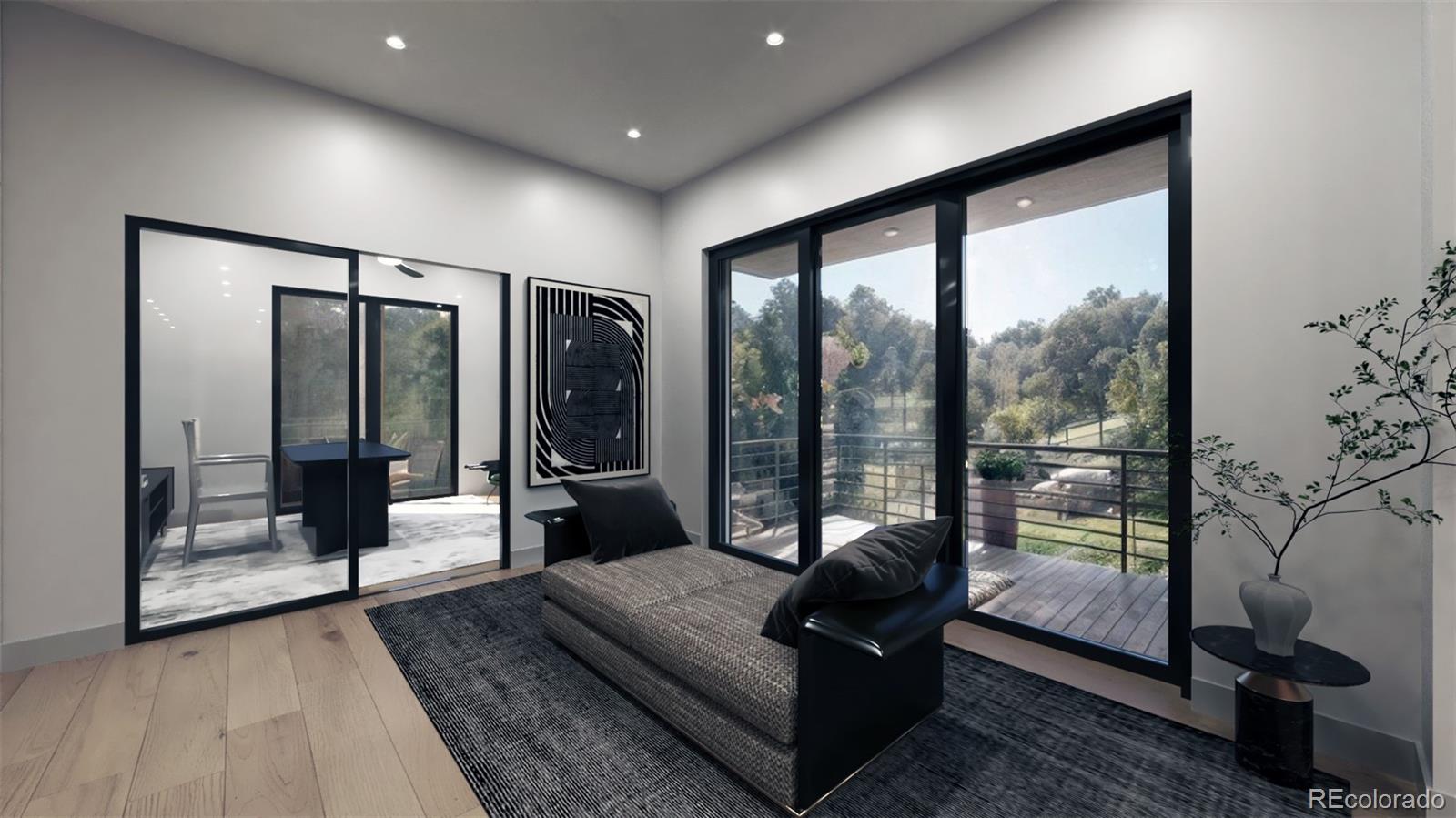 799 Clear Creek Road Evergreen, CO 80439 - Photo 10 of 26 a living room with glass top table and a large window