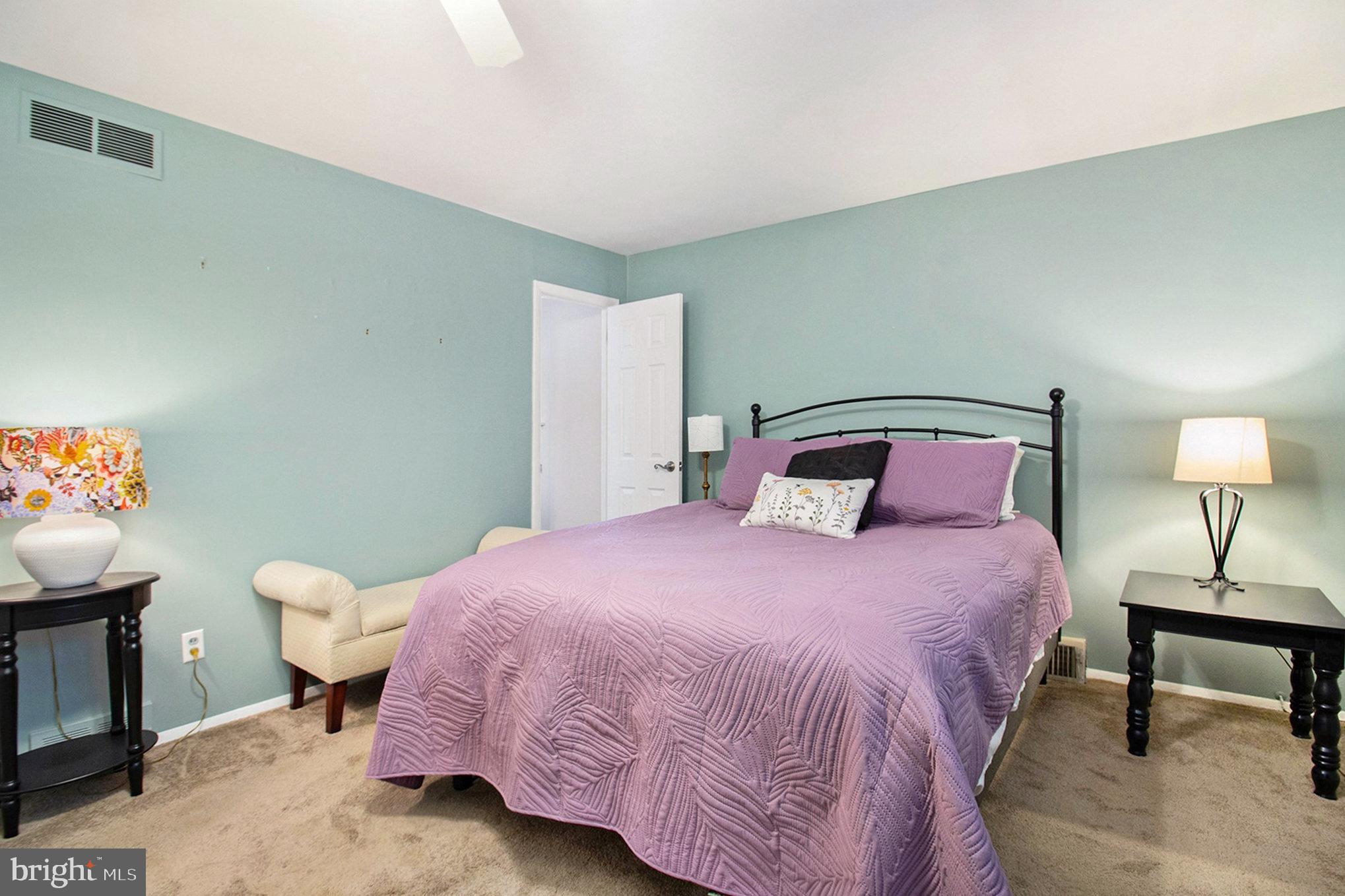 816 Lawler Street Philadelphia, PA 19116 - Photo 16 of 47 a bedroom with a bed and a lamp