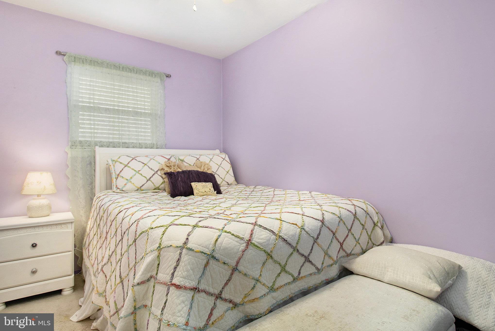 816 Lawler Street Philadelphia, PA 19116 - Photo 18 of 47 a bedroom with a bed and a window