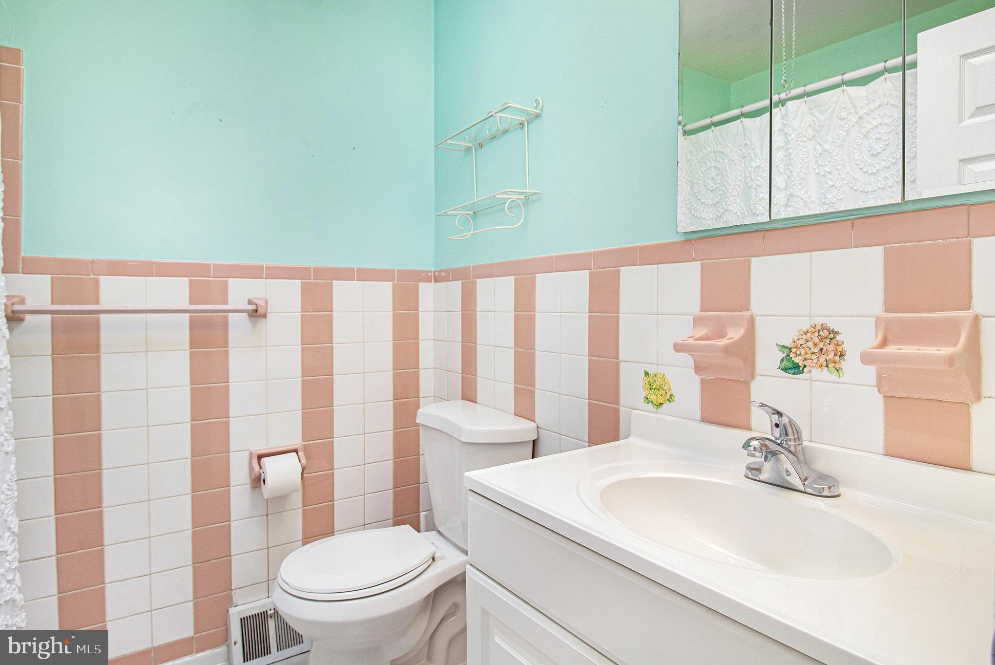 816 Lawler Street Philadelphia, PA 19116 - Photo 20 of 47 a bathroom with a sink a toilet and shower