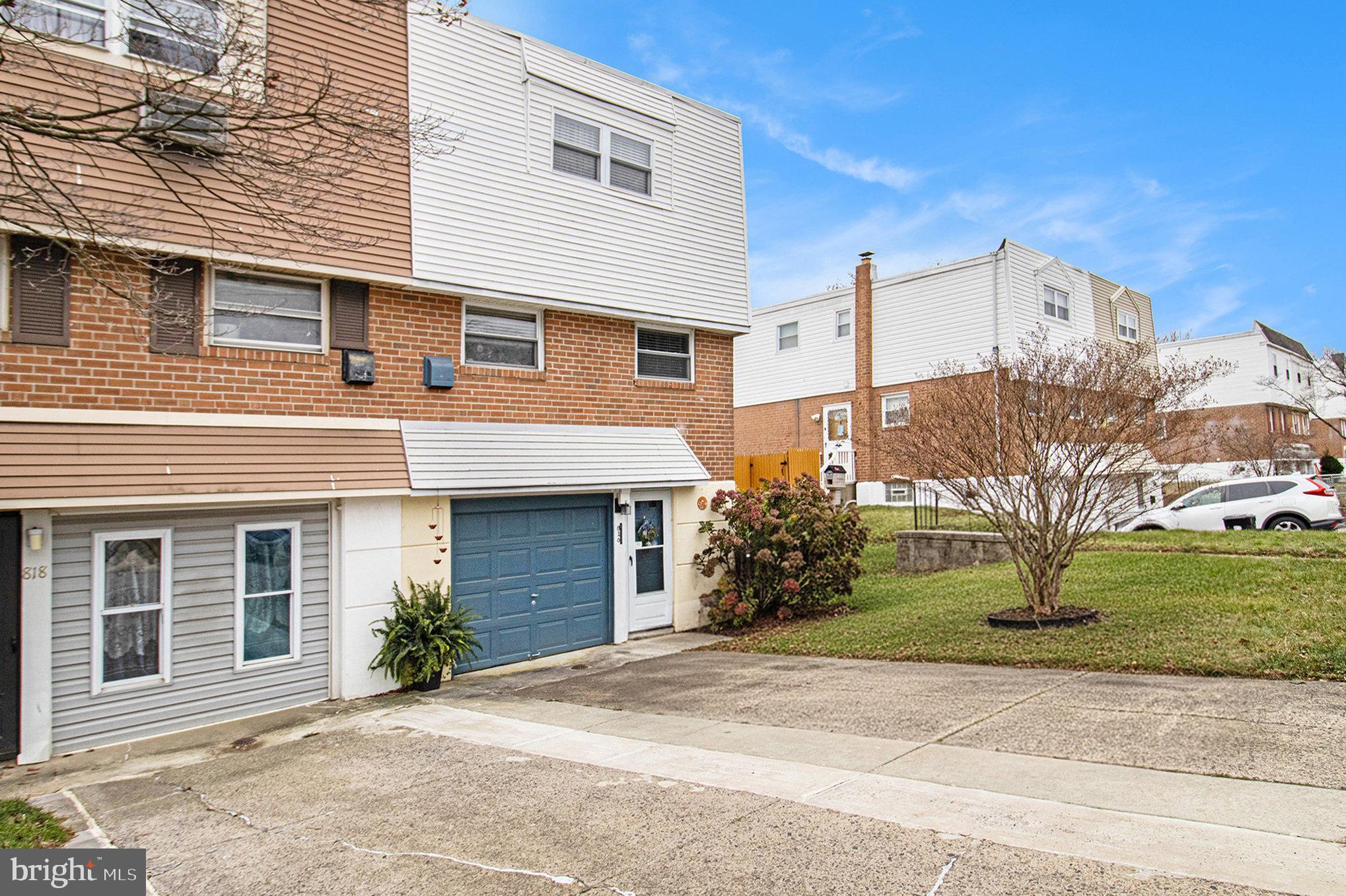 816 Lawler Street Philadelphia, PA 19116 - Photo 2 of 47 a front view of a house with garden