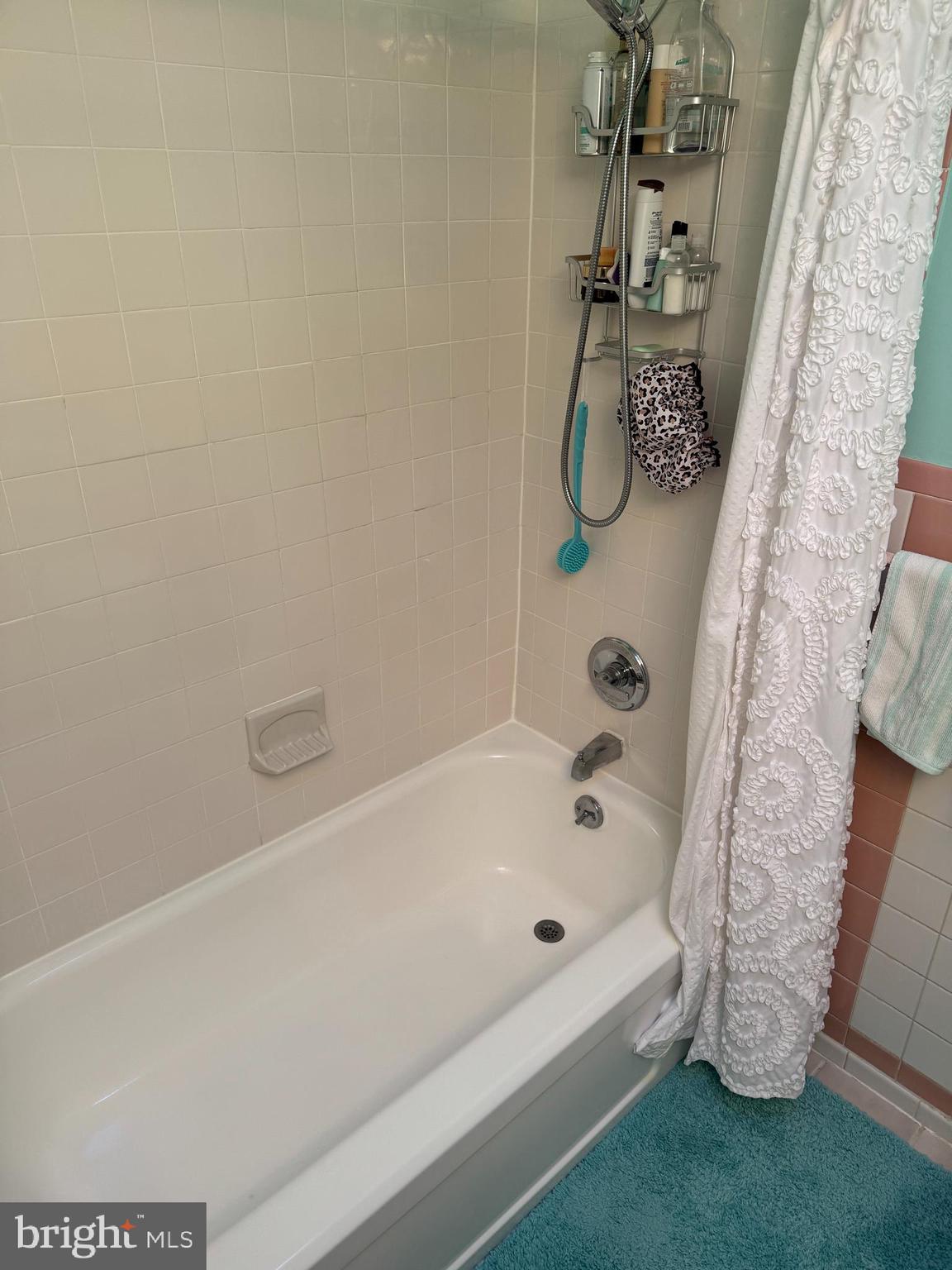 816 Lawler Street Philadelphia, PA 19116 - Photo 24 of 47 a bathroom with a tub and a shower