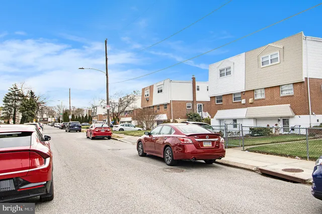 a car parked in front of a house