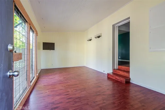 a view of livingroom with hardwood floor and window