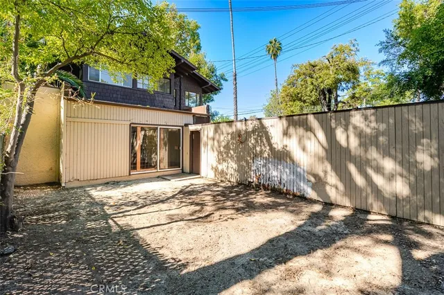 a view of a house with a street
