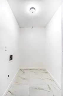 a view of a room with rack on the wall