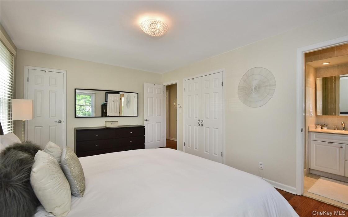 9 Franklin Avenue Rye, NY 10580 - Photo 16 of 35 a bedroom with a bed and a dresser
