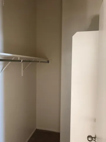 a bathroom with a sink double vanity and a mirror