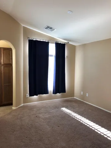 a view of a flower in a yard