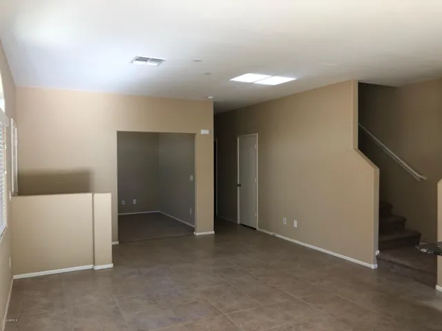 an empty room with a bathroom