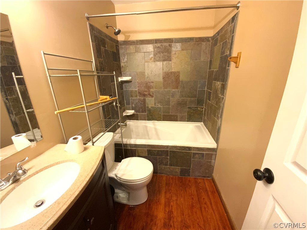 2030 Shallow Well Road Manakin-Sabot, VA 23129 - Photo 13 of 25 a bathroom with a sink and a mirror