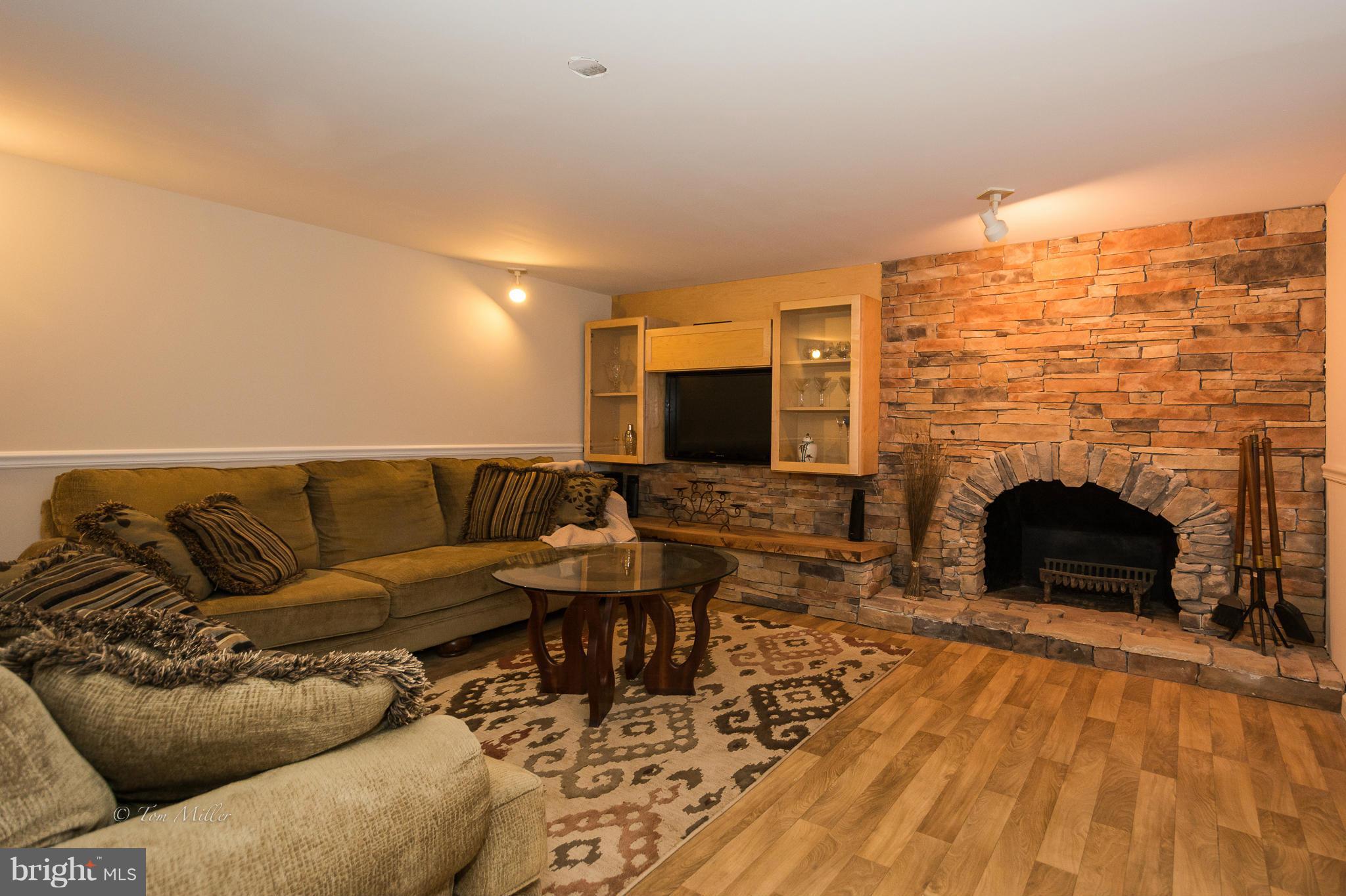 5302 Ridge Road Mount Airy, MD 21771 - Photo 27 of 30 family room with wood burning fireplace