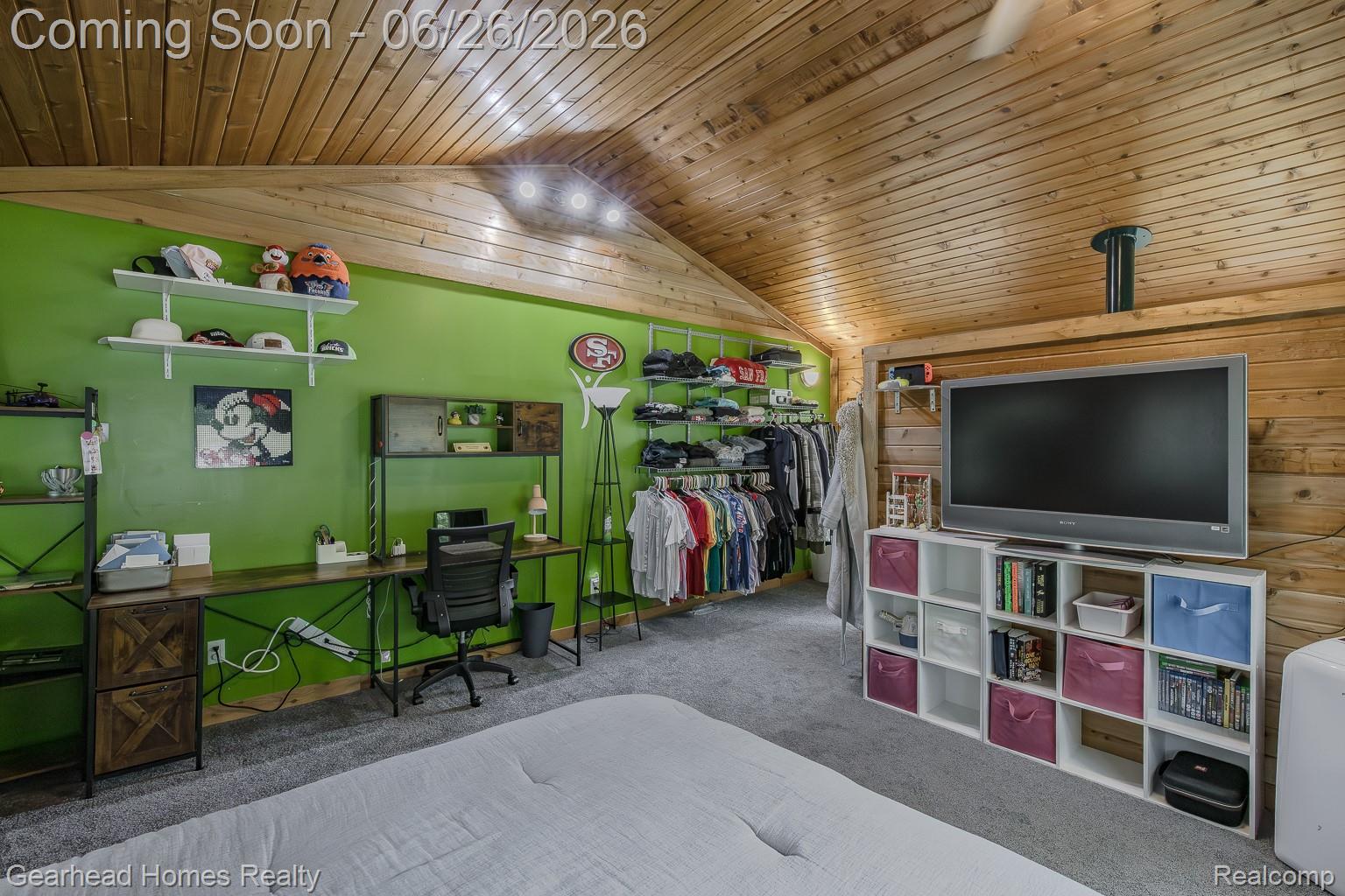 12364 Morrish Road Clio, MI 48420 - Photo 41 of 81 Vaulted wood-finish ceiling with exposed beams