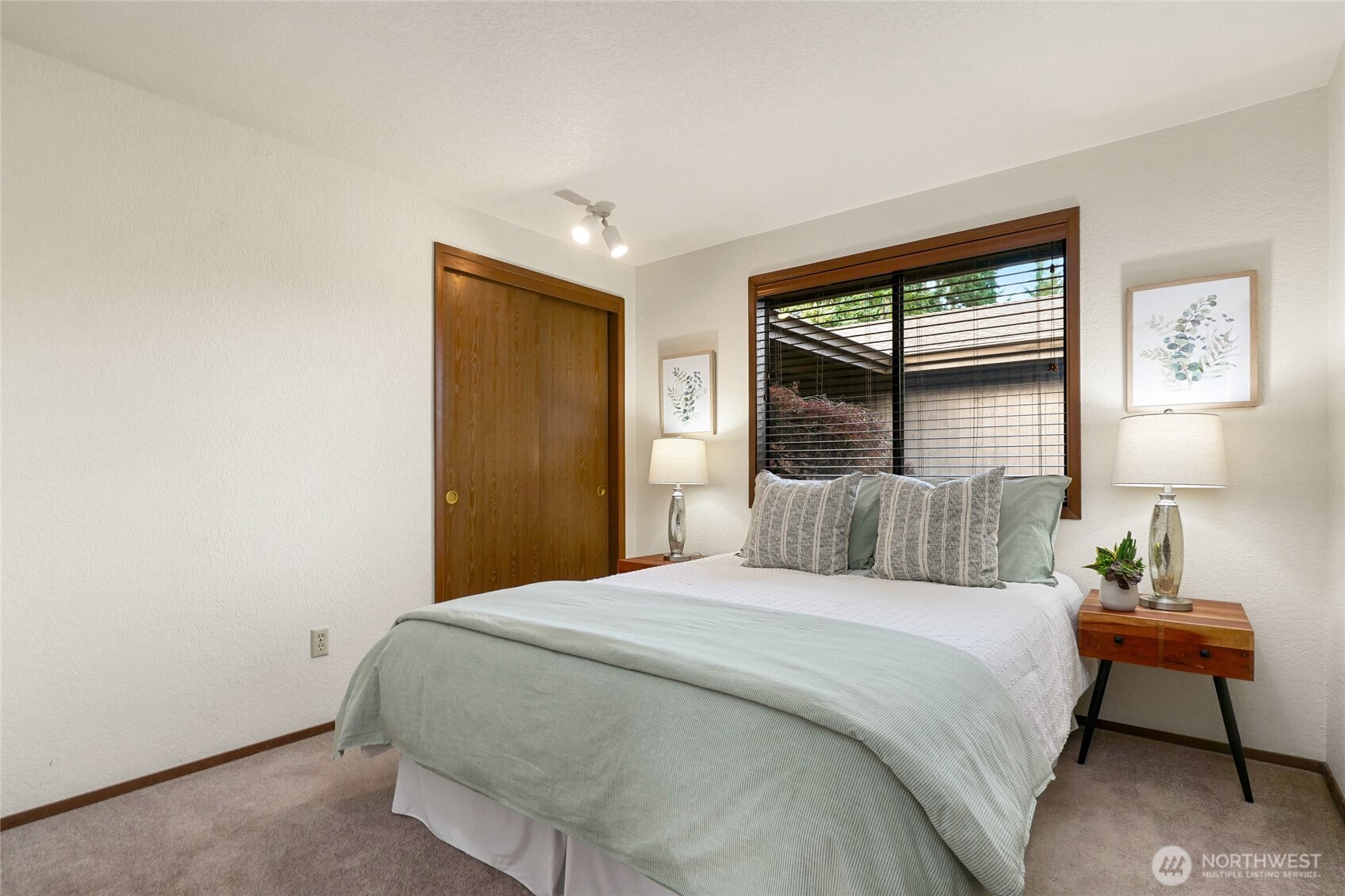 401 169th Street Southeast Bothell, WA 98012 - Photo 18 of 27 a bedroom with a bed and a night stand