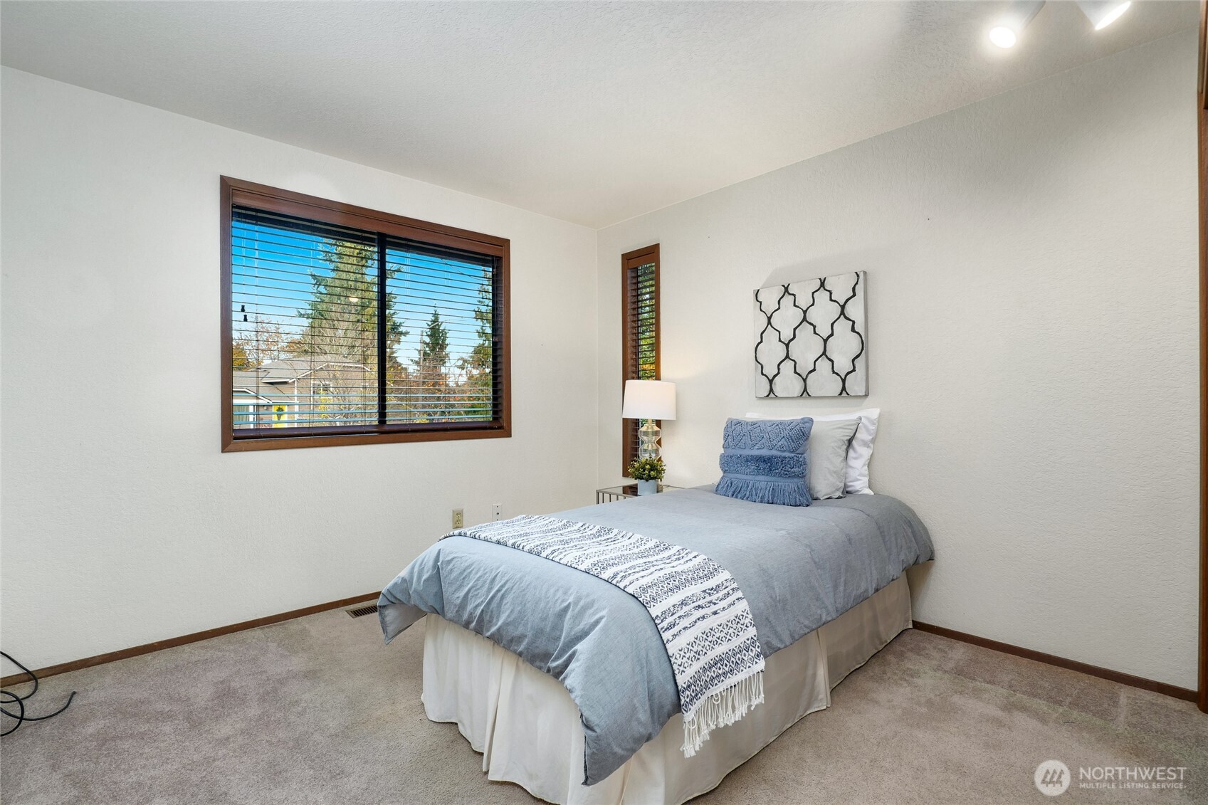401 169th Street Southeast Bothell, WA 98012 - Photo 20 of 27 a bedroom with a bed and a window