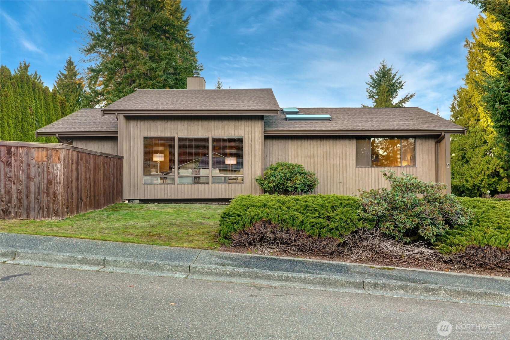 401 169th Street Southeast Bothell, WA 98012 - Photo 22 of 27 a front view of a house with a garden