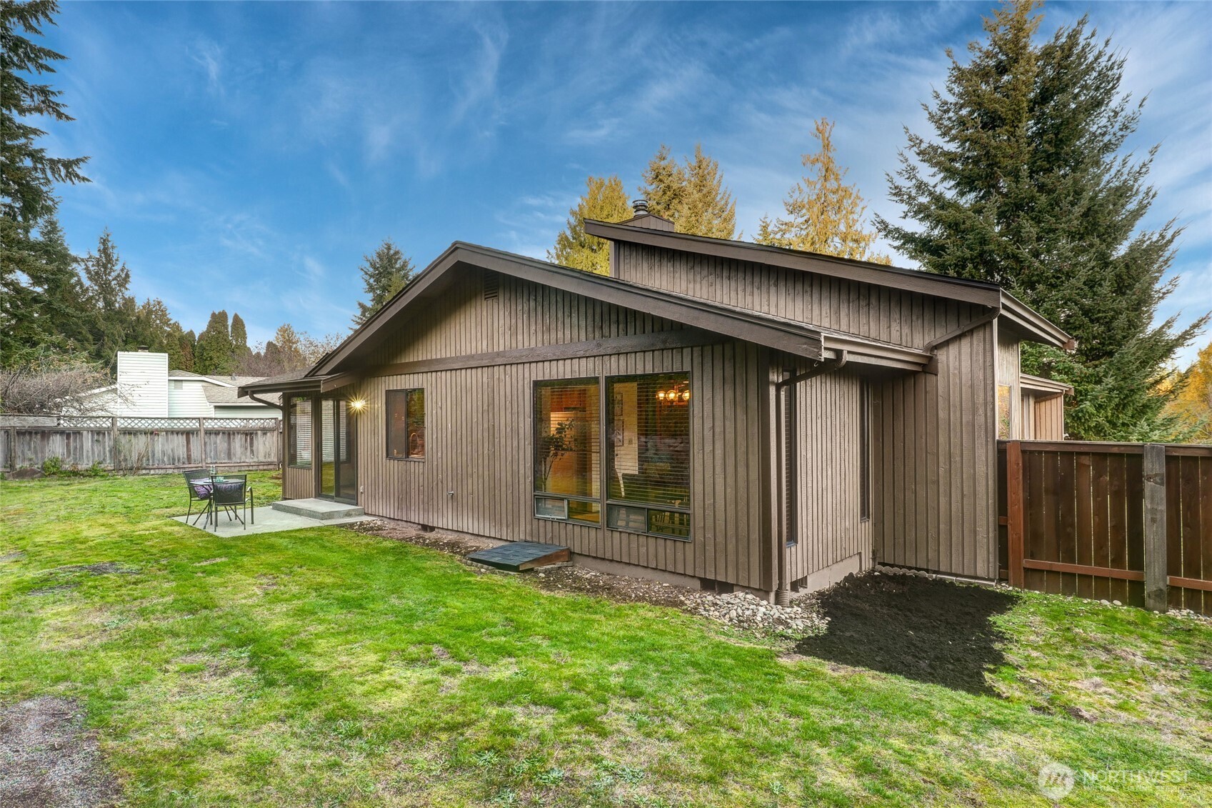 401 169th Street Southeast Bothell, WA 98012 - Photo 25 of 27 a view of a house with yard and a garden