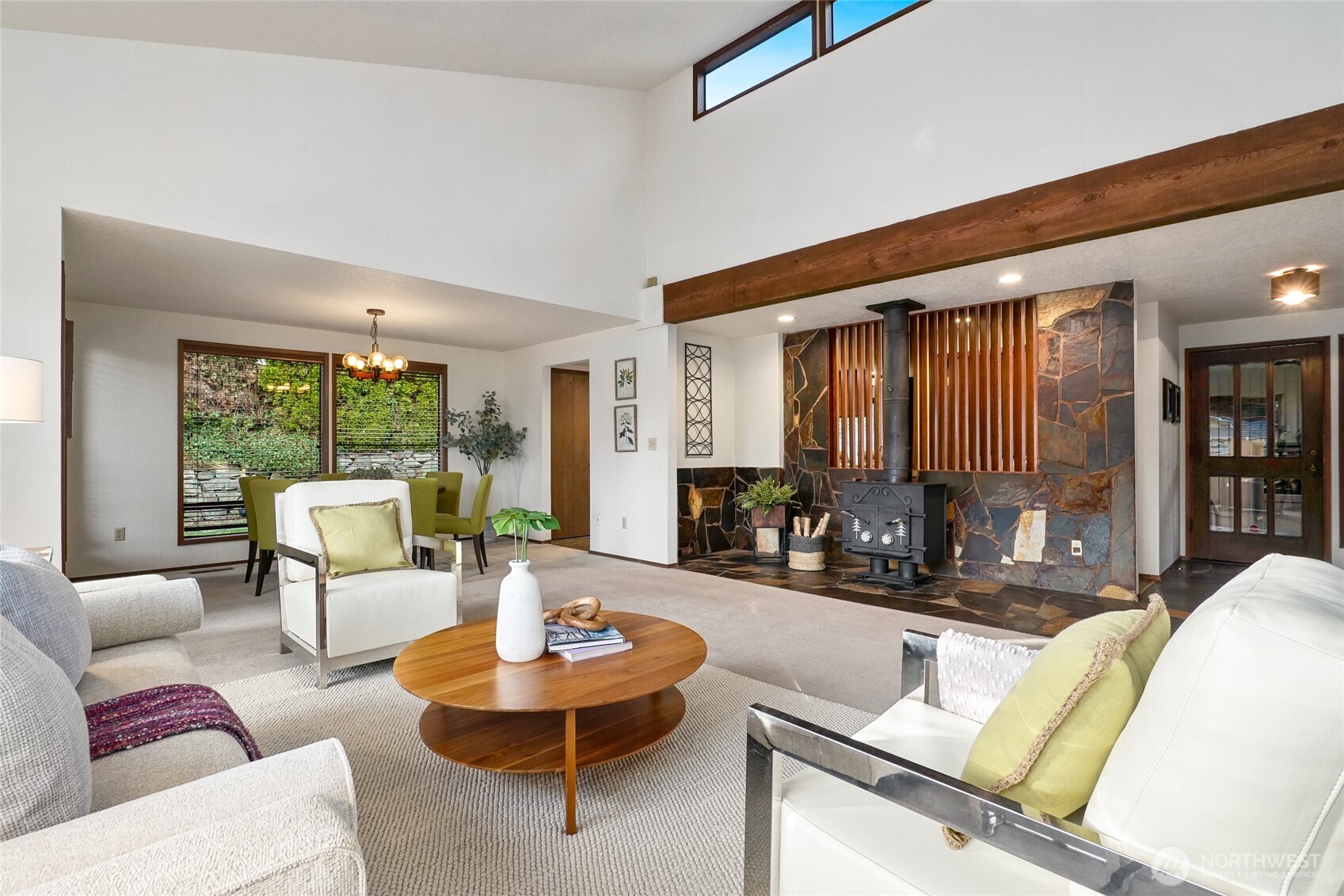 401 169th Street Southeast Bothell, WA 98012 - Photo 3 of 27 a living room with furniture and a large window