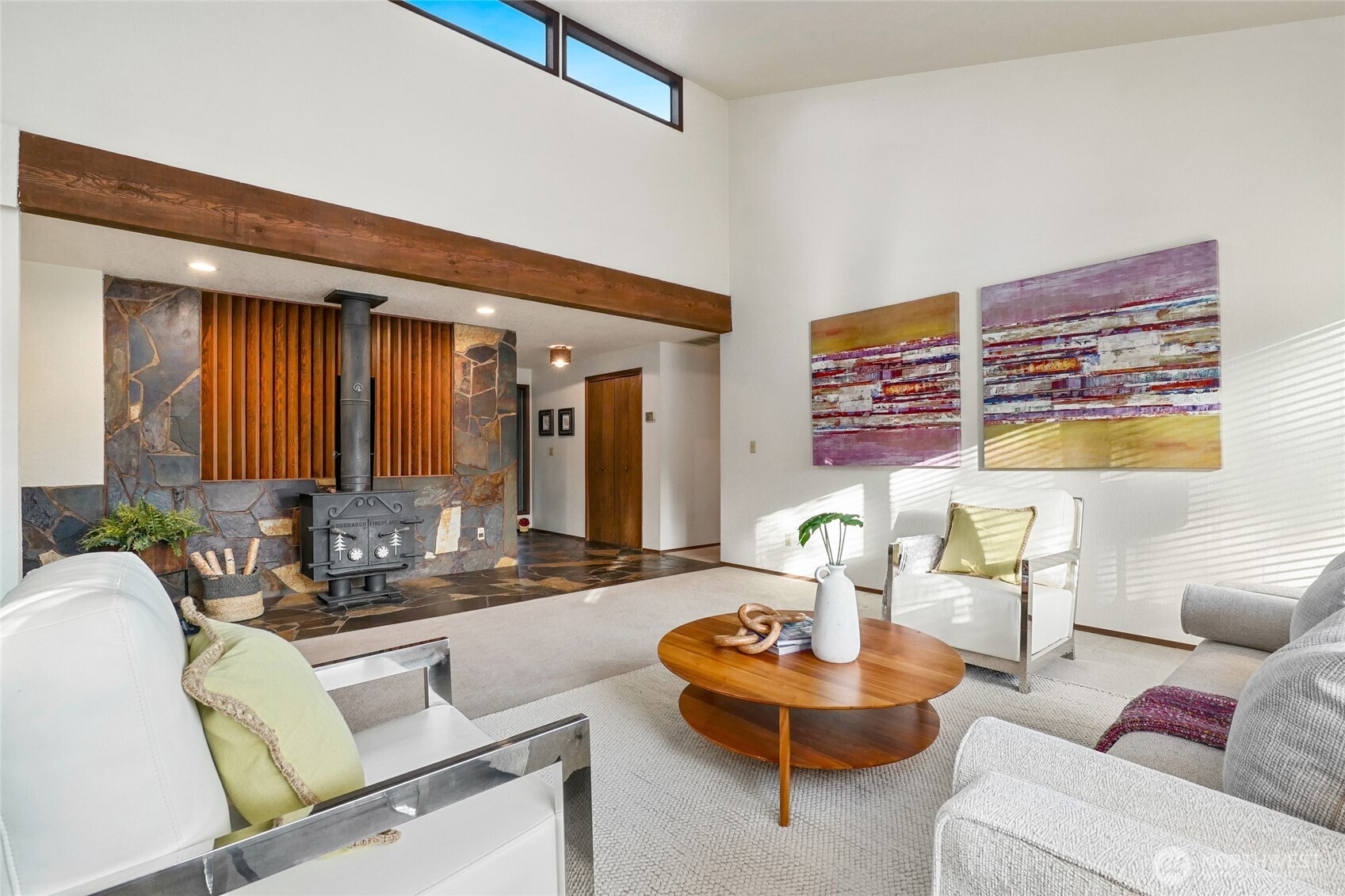 401 169th Street Southeast Bothell, WA 98012 - Photo 4 of 27 a living room with furniture and a large window