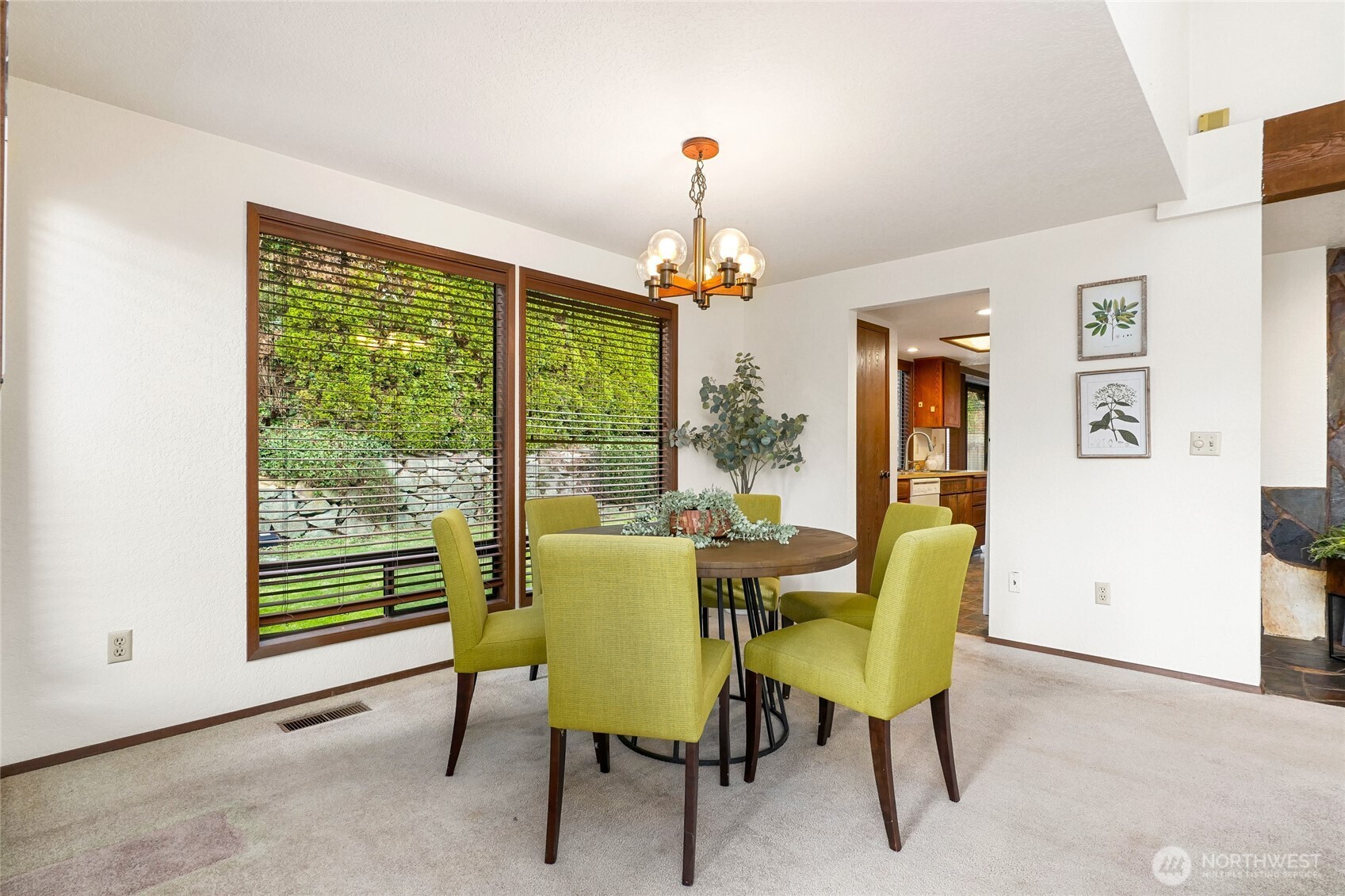 401 169th Street Southeast Bothell, WA 98012 - Photo 7 of 27 a dining room with furniture a chandelier and window