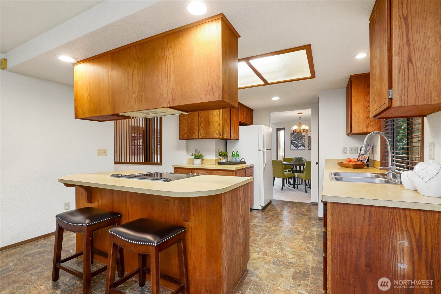 401 169th Street Southeast Bothell, WA 98012 - Photo 10 of 27 a kitchen with a sink cabinets and counter space