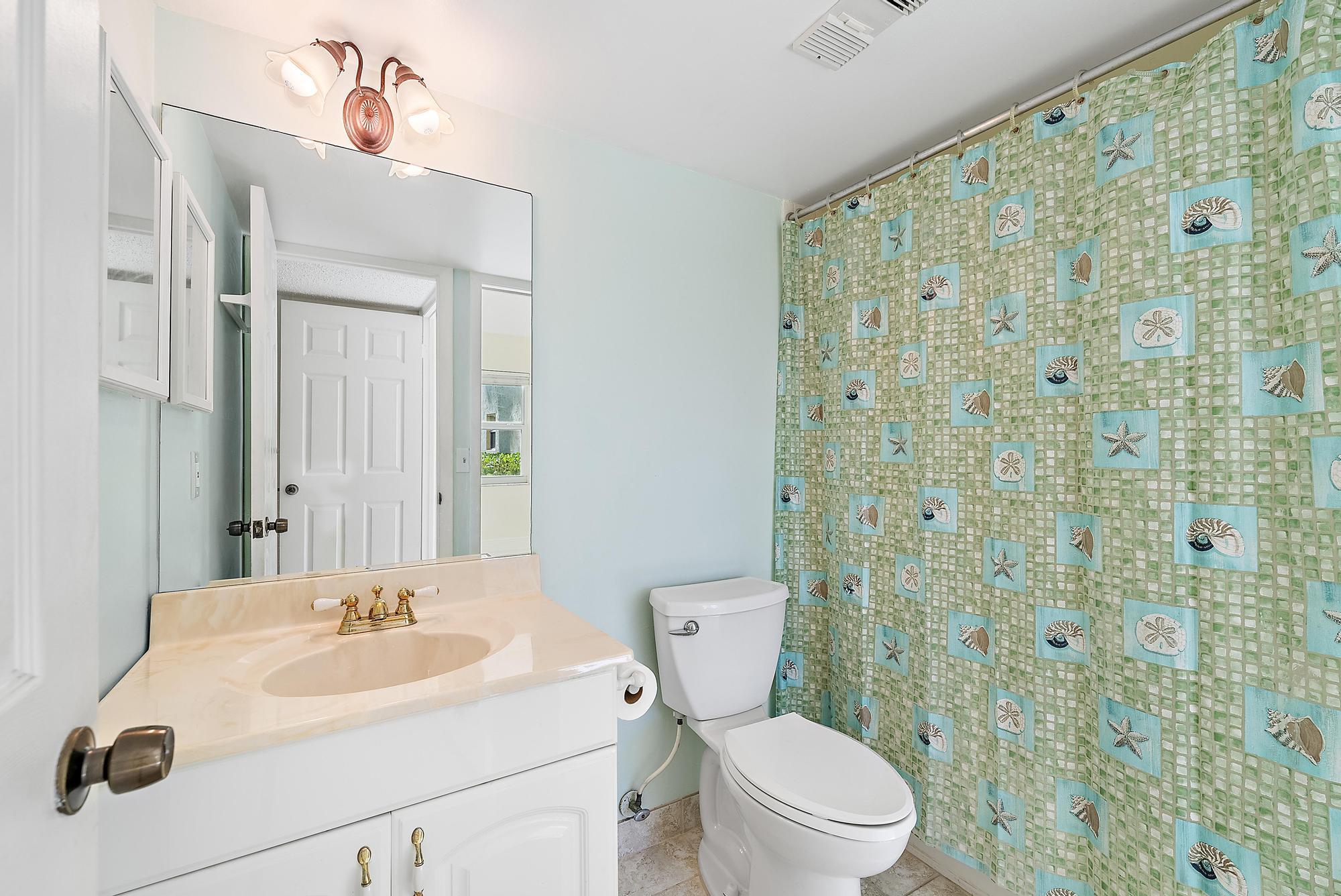717 Highway 1, Unit 108 Jupiter, FL 33477 - Photo 22 of 32 Guest Bath
