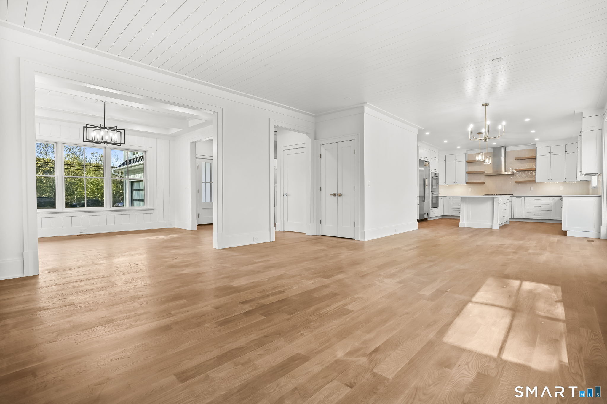 20 Locust Hill Road Darien, CT 06820 - Photo 5 of 30 Family room overlooking kitchen and dining room