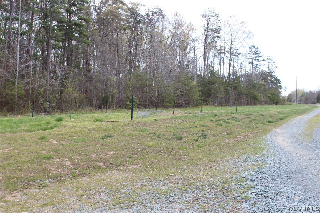 8103 Venable Road Kents Store, VA 23084 - Photo 22 of 23 a view of a field with trees in background