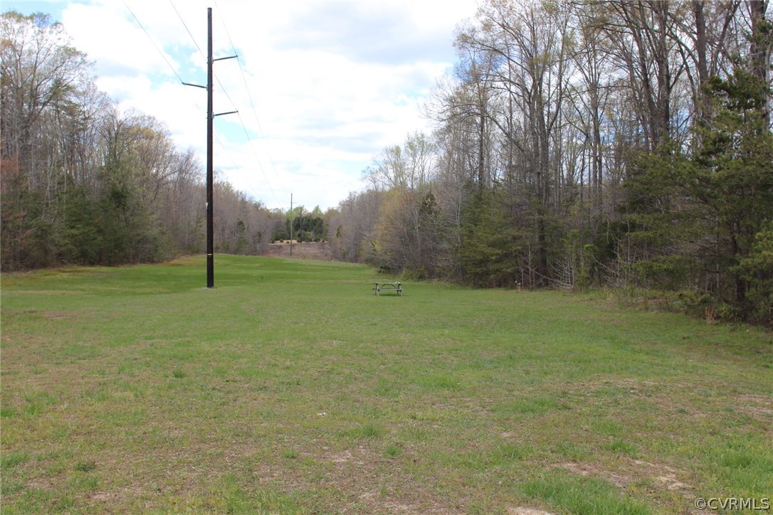 8103 Venable Road Kents Store, VA 23084 - Photo 23 of 23 a view of a field with trees in the background