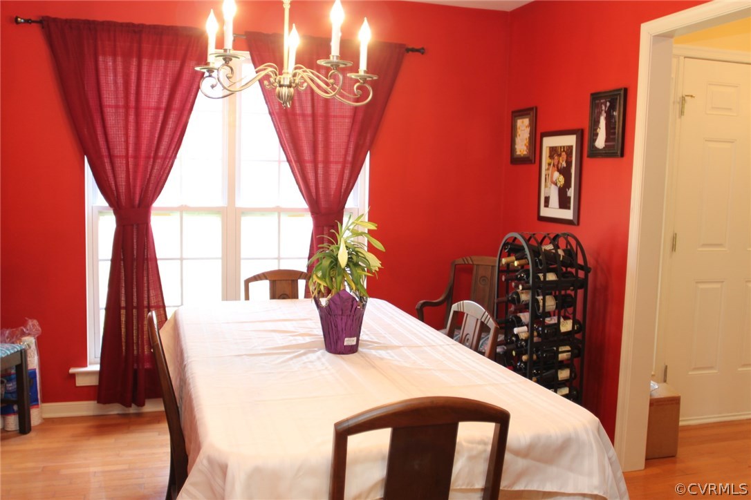 8103 Venable Road Kents Store, VA 23084 - Photo 3 of 23 a dining room with a table and chairs