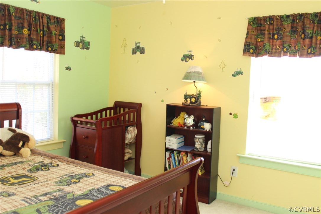 8103 Venable Road Kents Store, VA 23084 - Photo 10 of 23 a bedroom with a bed and dresser