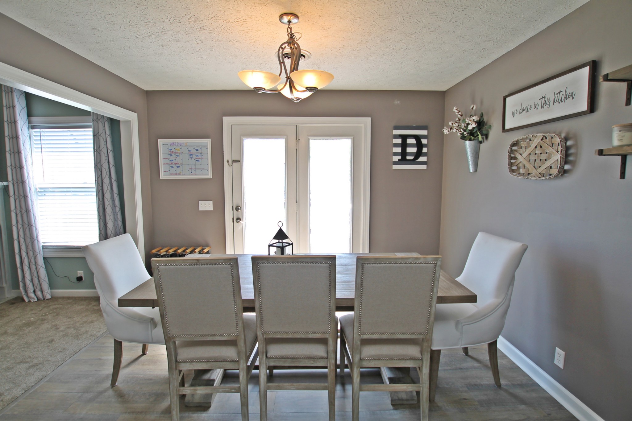 140 Fieldstone Lane Springfield, TN 37172 - Photo 12 of 41 a view of a dining room with furniture window and wooden floor