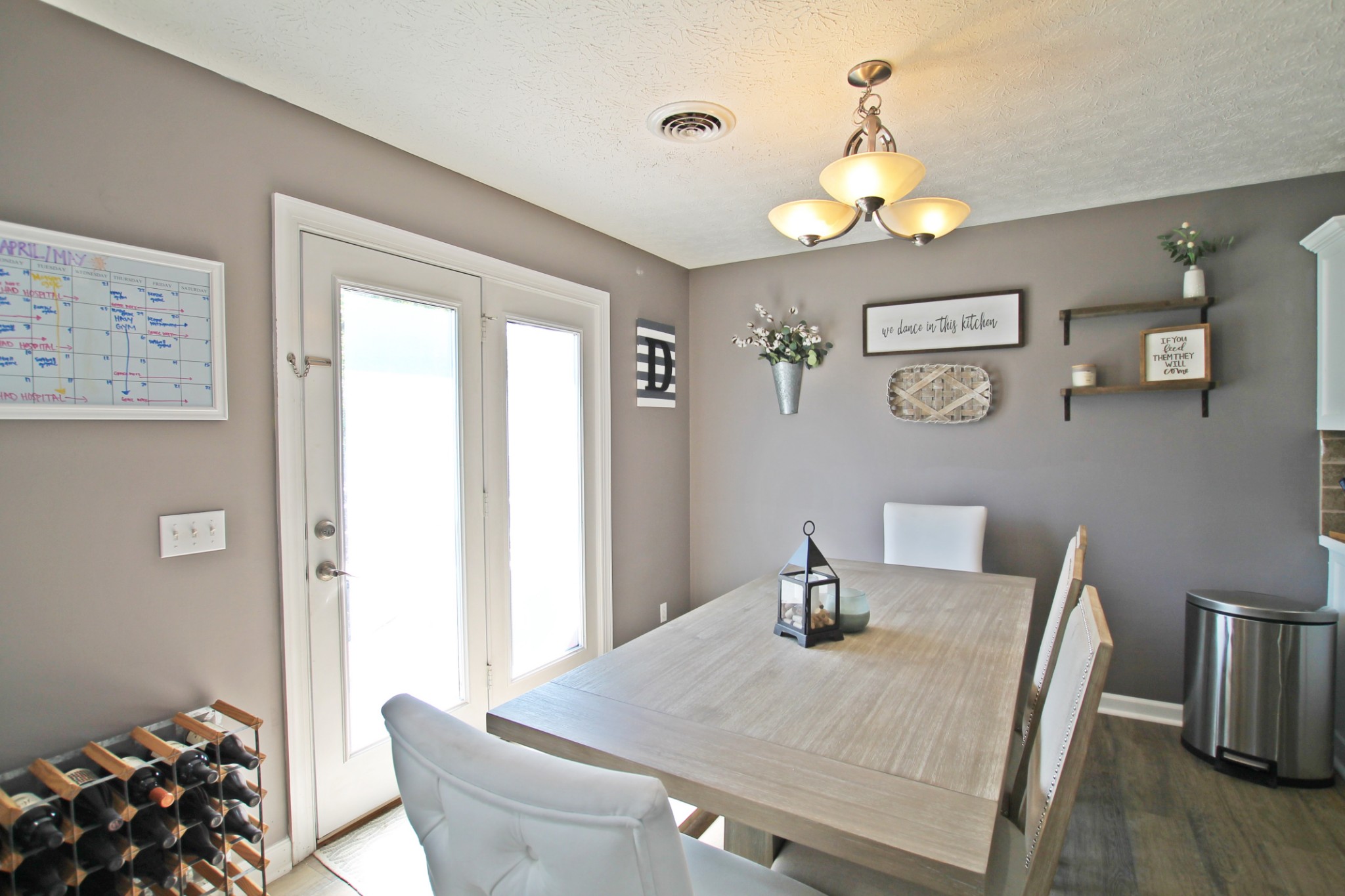 140 Fieldstone Lane Springfield, TN 37172 - Photo 14 of 41 a view of a dining room with furniture and wooden floor