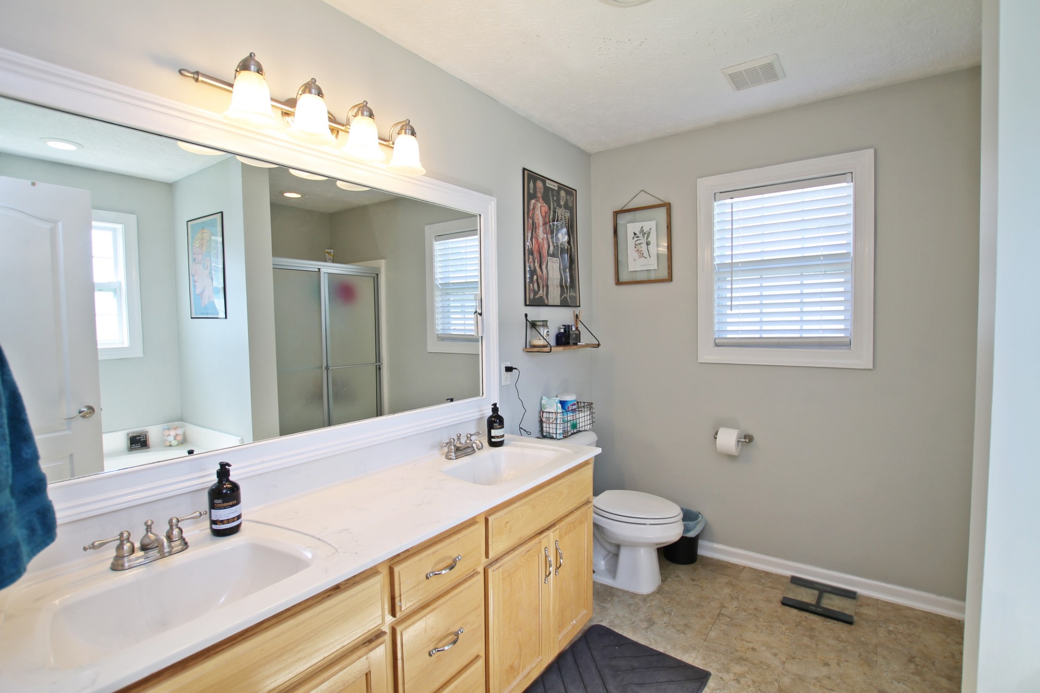 140 Fieldstone Lane Springfield, TN 37172 - Photo 19 of 41 a bathroom with a double vanity sink mirror and toilet