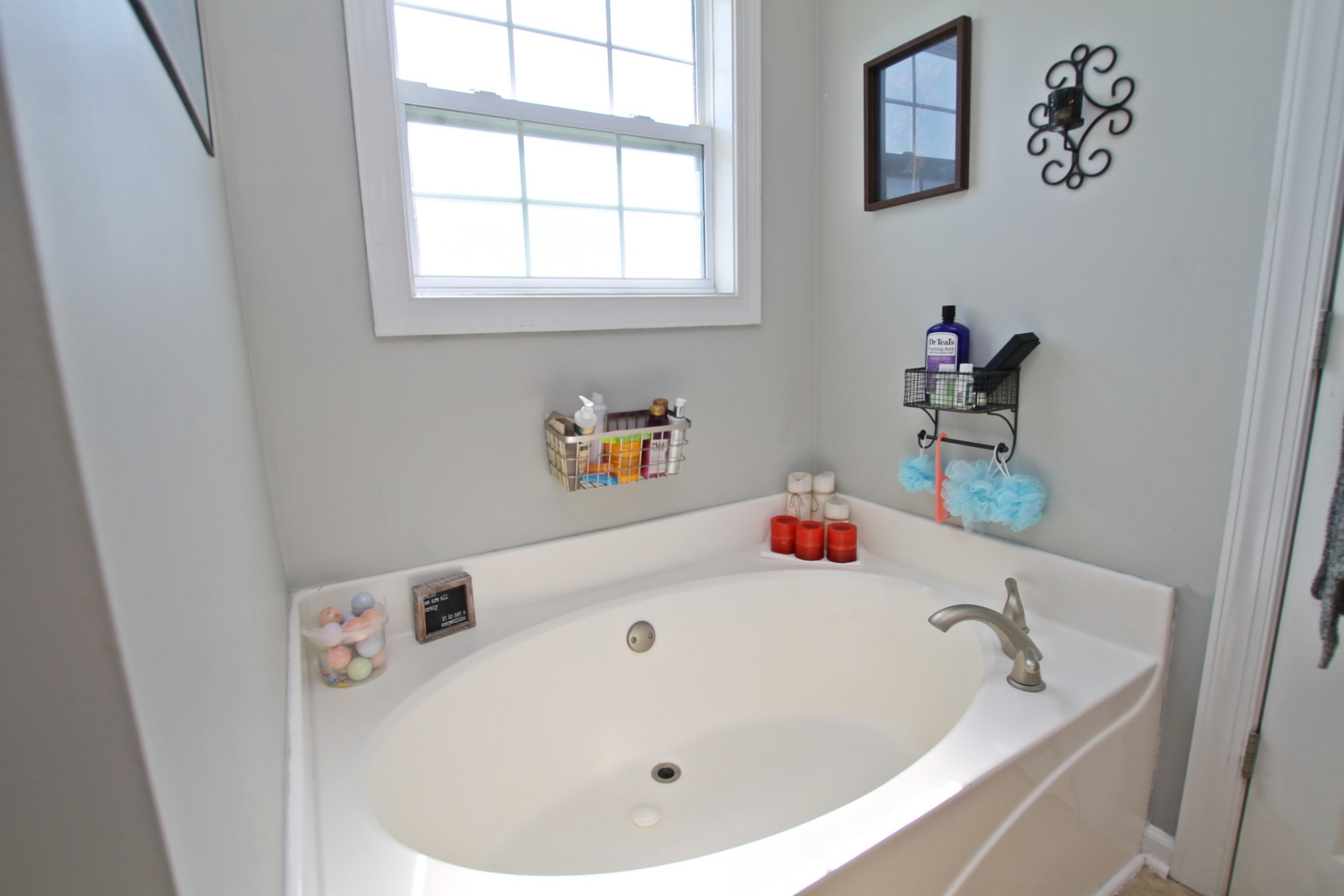 140 Fieldstone Lane Springfield, TN 37172 - Photo 21 of 41 a bathroom with a tub and a window