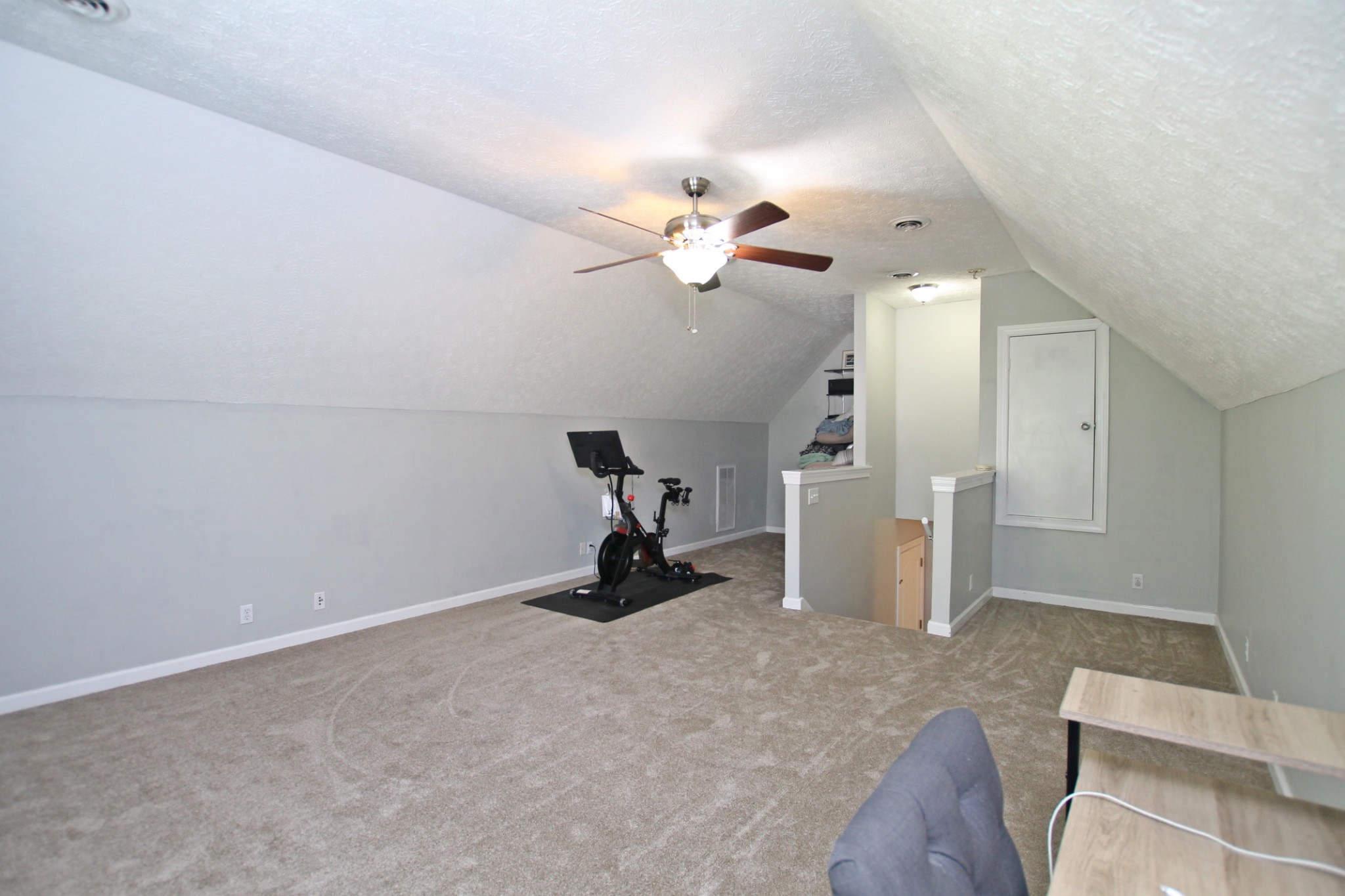 140 Fieldstone Lane Springfield, TN 37172 - Photo 31 of 41 a view of a room with gym equipment and a ceiling fan