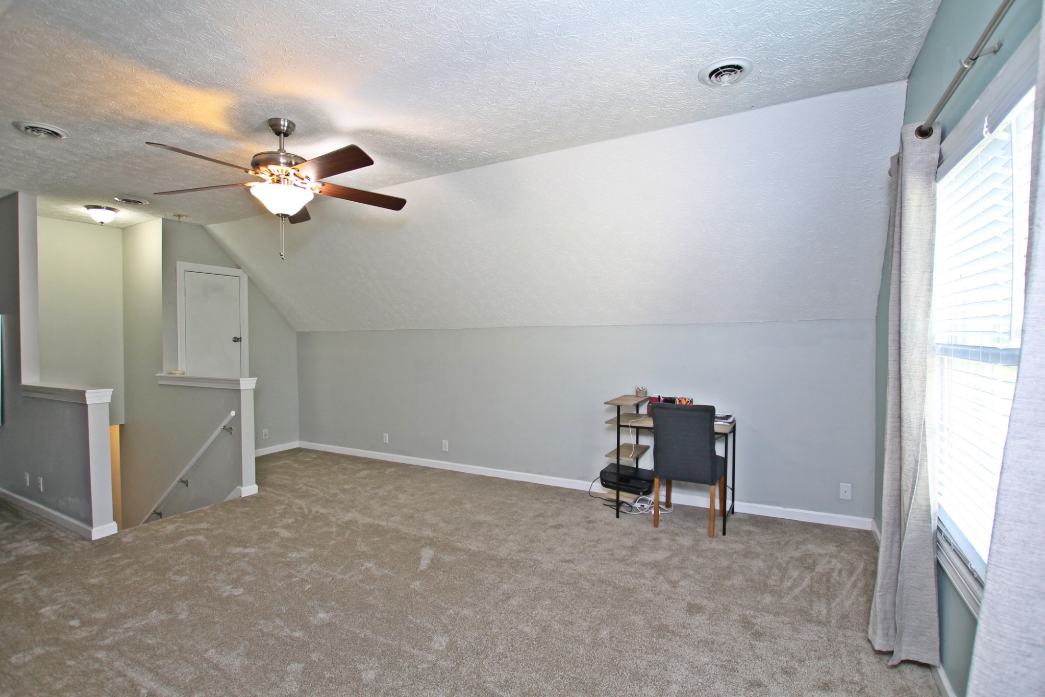 140 Fieldstone Lane Springfield, TN 37172 - Photo 32 of 41 a view of a livingroom with a ceiling fan and window