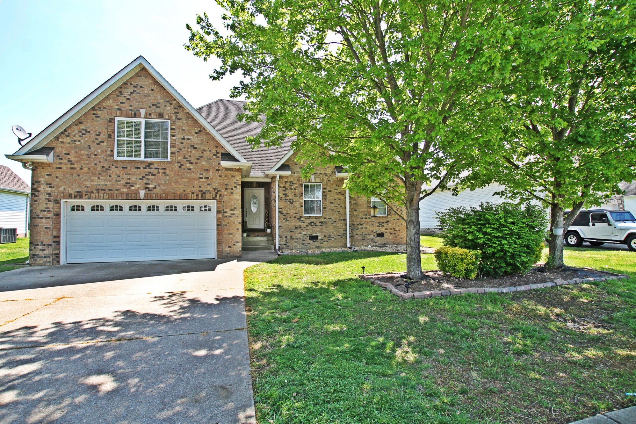 140 Fieldstone Lane Springfield, TN 37172 - Photo 41 of 41 a front view of a house with a yard and garage