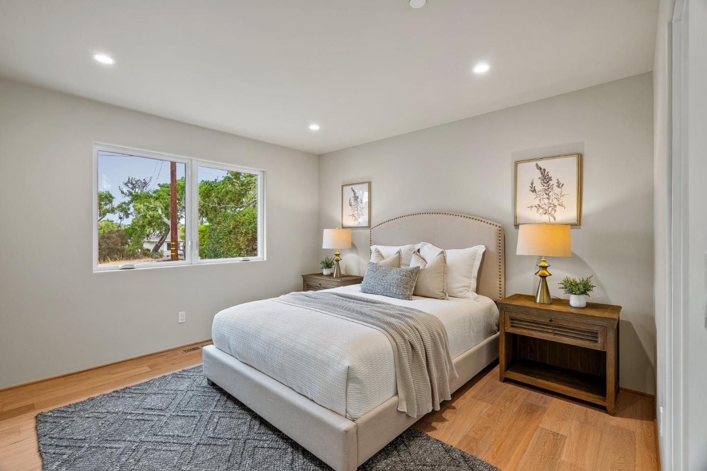 2869 Forest Lodge Road Pebble Beach, CA 93953 - Photo 16 of 34 a bedroom with a bed and a window