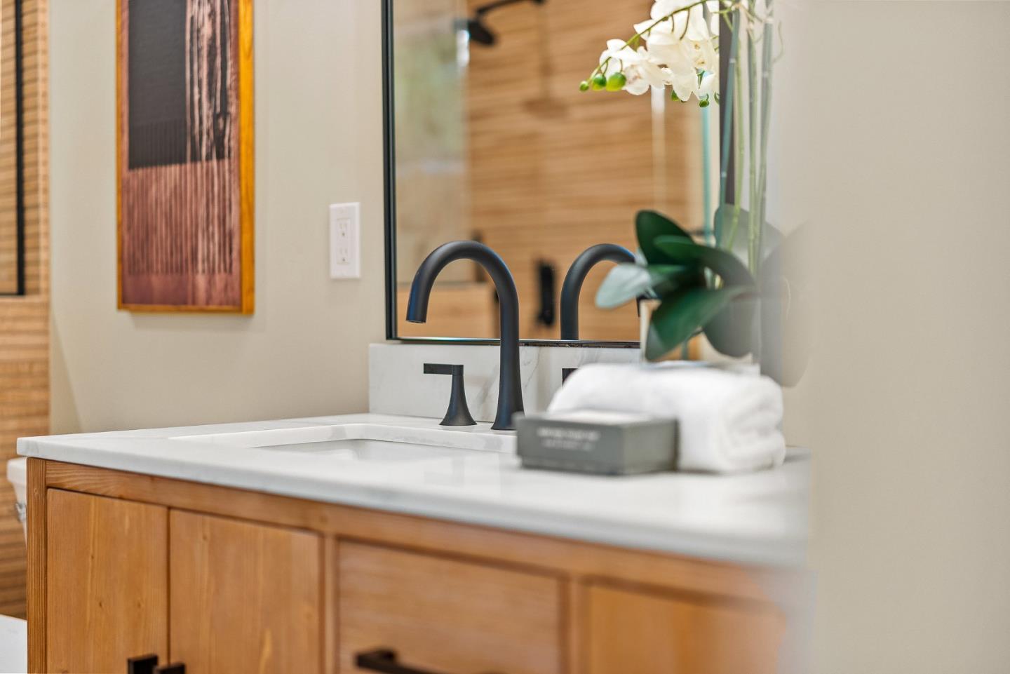 2869 Forest Lodge Road Pebble Beach, CA 93953 - Photo 24 of 34 a bathroom with a sink and a mirror