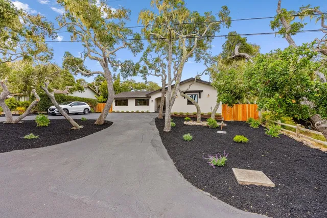 a view of a street with cars