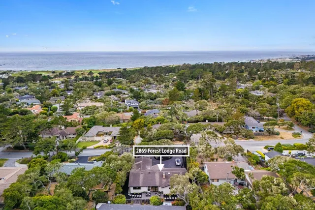 an aerial view of a city with lots of residential buildings
