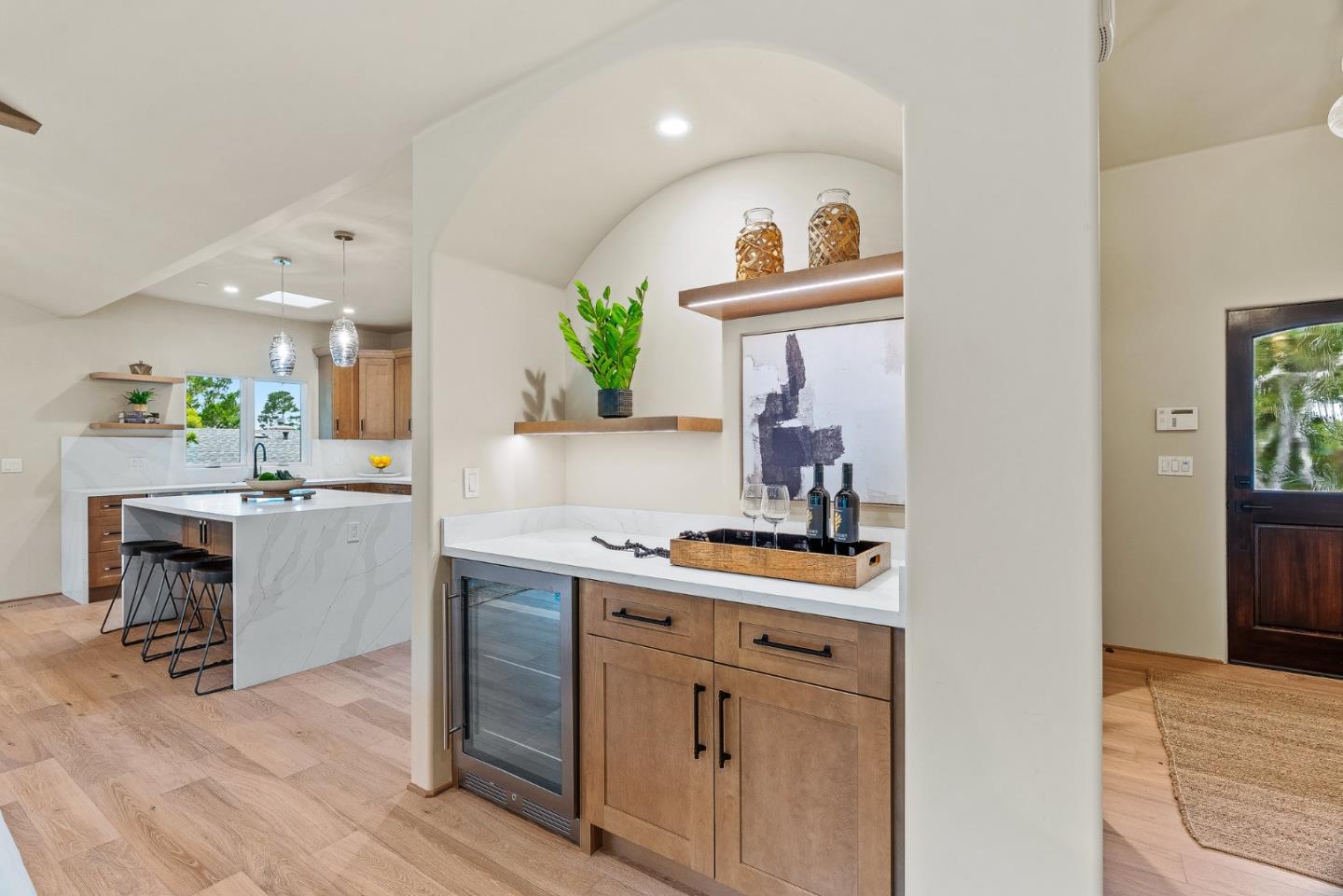 2869 Forest Lodge Road Pebble Beach, CA 93953 - Photo 6 of 34 a kitchen with a sink cabinets and wooden floor