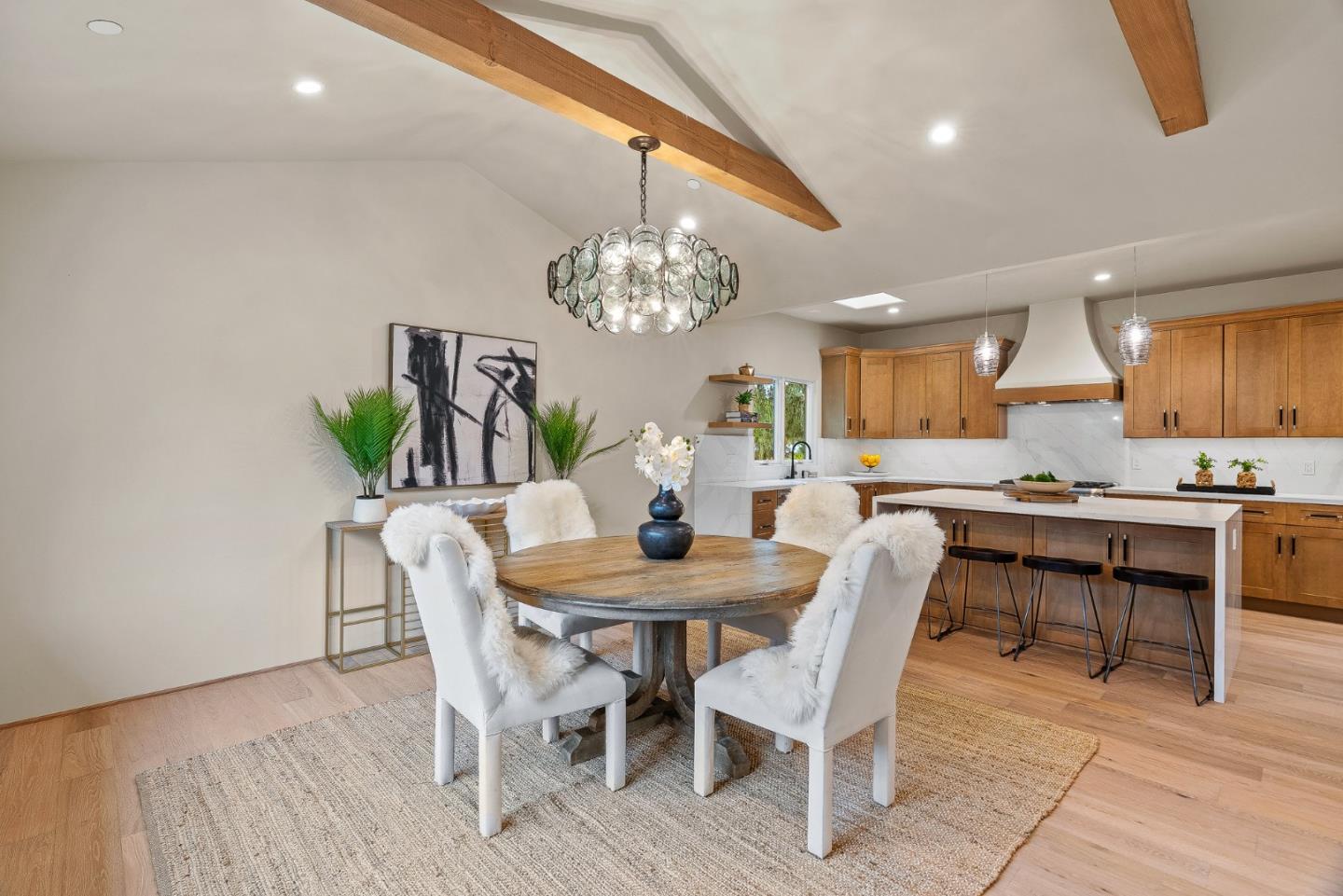 2869 Forest Lodge Road Pebble Beach, CA 93953 - Photo 7 of 34 a view of a dining room with furniture and chandelier