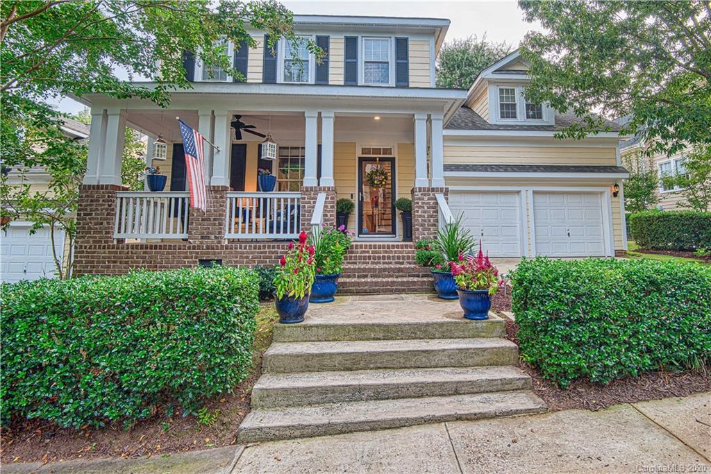 3224 Fifth Baxter Crossing Fort Mill, SC 29708 - Photo 1 of 41 a view of a house with potted plants and a fountain