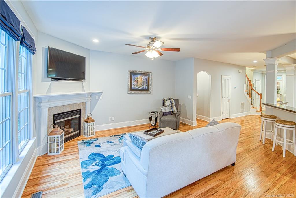 3224 Fifth Baxter Crossing Fort Mill, SC 29708 - Photo 12 of 41 a living room with furniture fireplace and flat screen tv