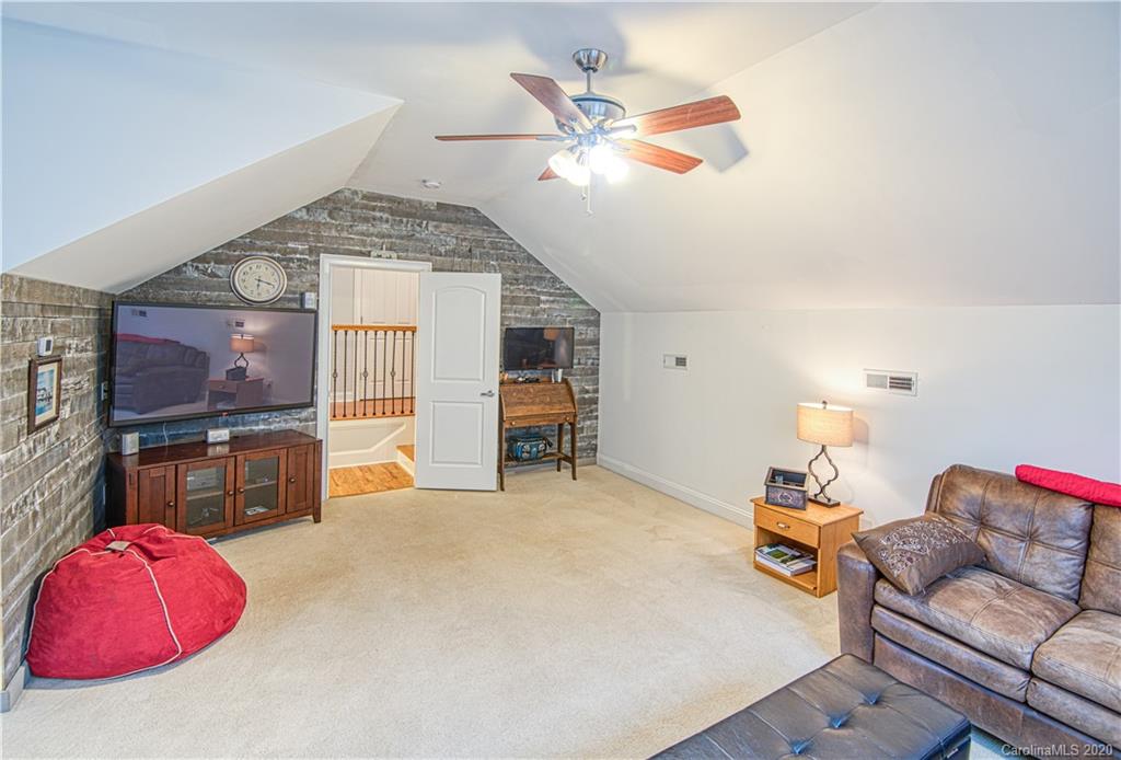 3224 Fifth Baxter Crossing Fort Mill, SC 29708 - Photo 15 of 41 a living room with furniture and a flat screen tv