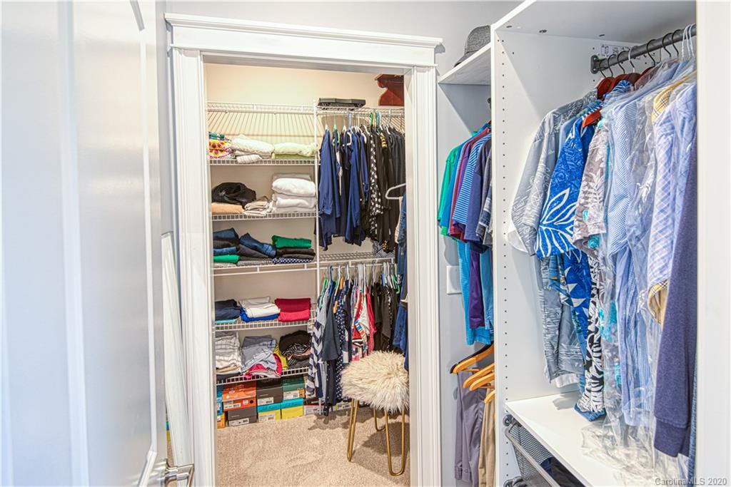 3224 Fifth Baxter Crossing Fort Mill, SC 29708 - Photo 20 of 41 a view of walk in closet with clothes and shoes
