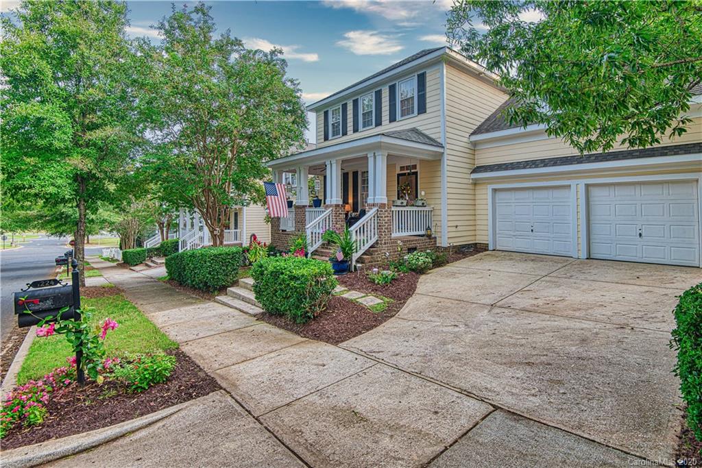 3224 Fifth Baxter Crossing Fort Mill, SC 29708 - Photo 3 of 41 a front view of a house with garden