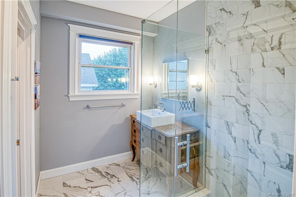 3224 Fifth Baxter Crossing Fort Mill, SC 29708 - Photo 21 of 41 a bathroom with a sink and a mirror
